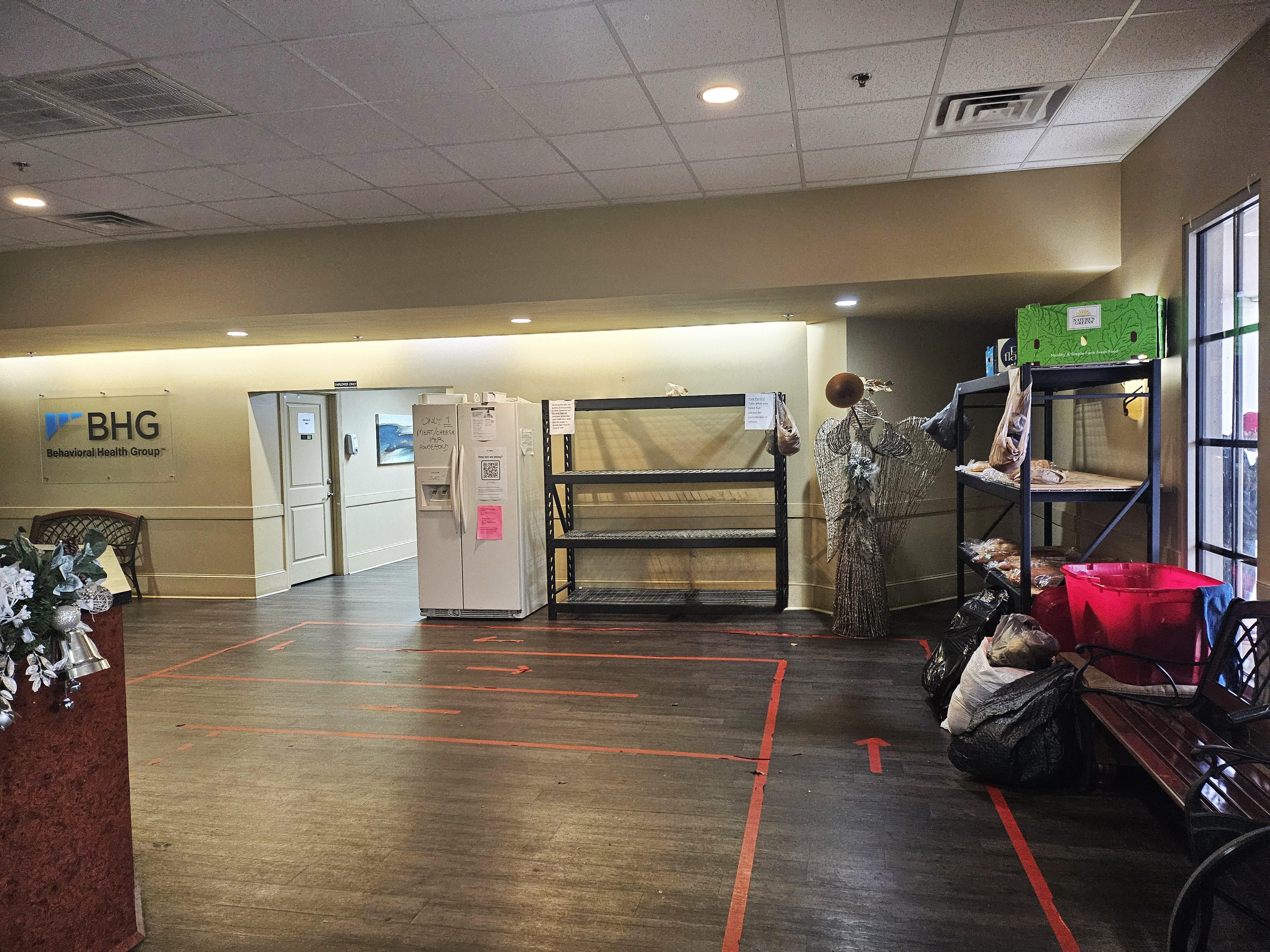 Lobby and common area with seating and BHG signage