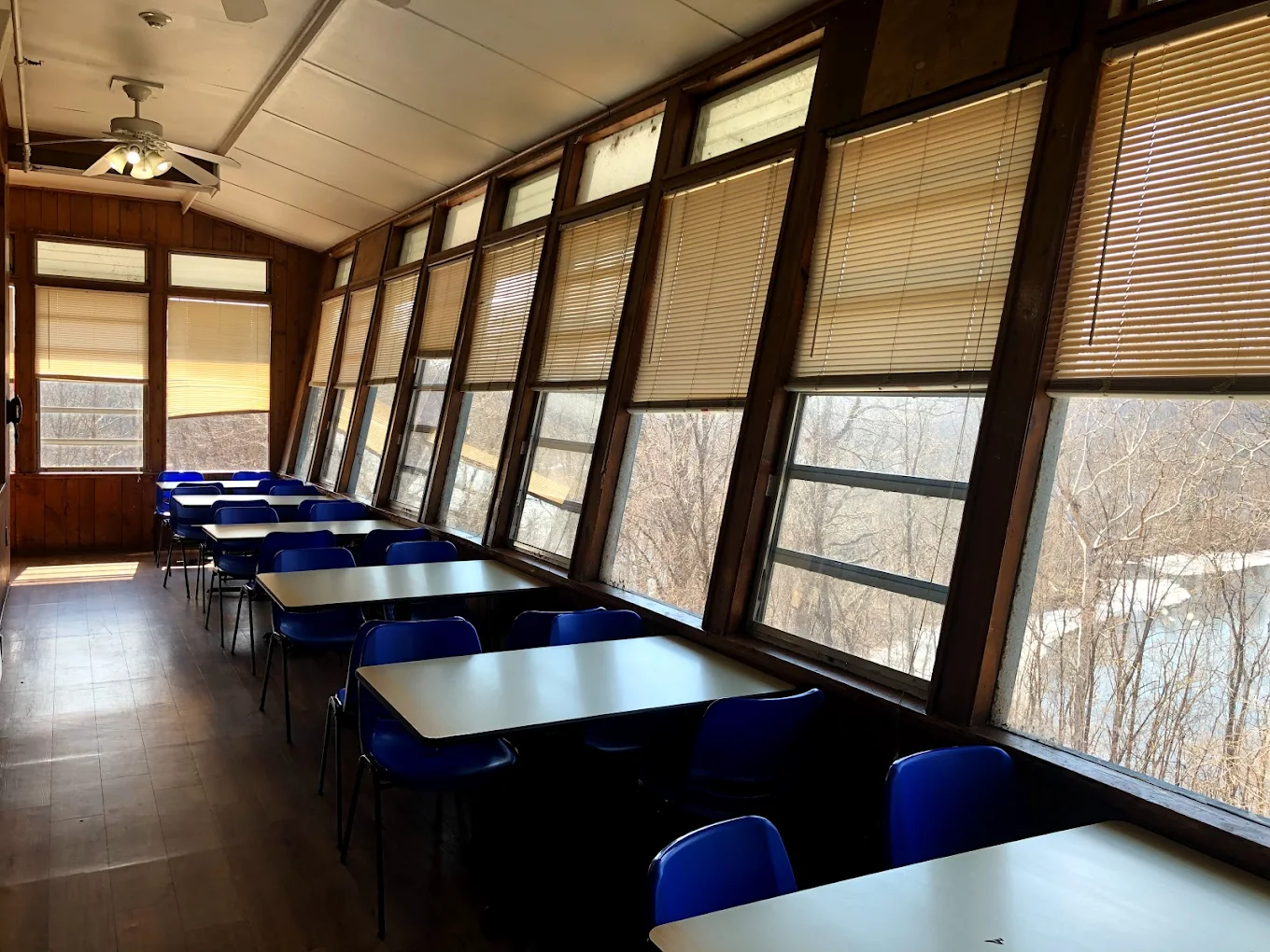 Dining room with tables and large windows at Cornerstone Rhinebeck