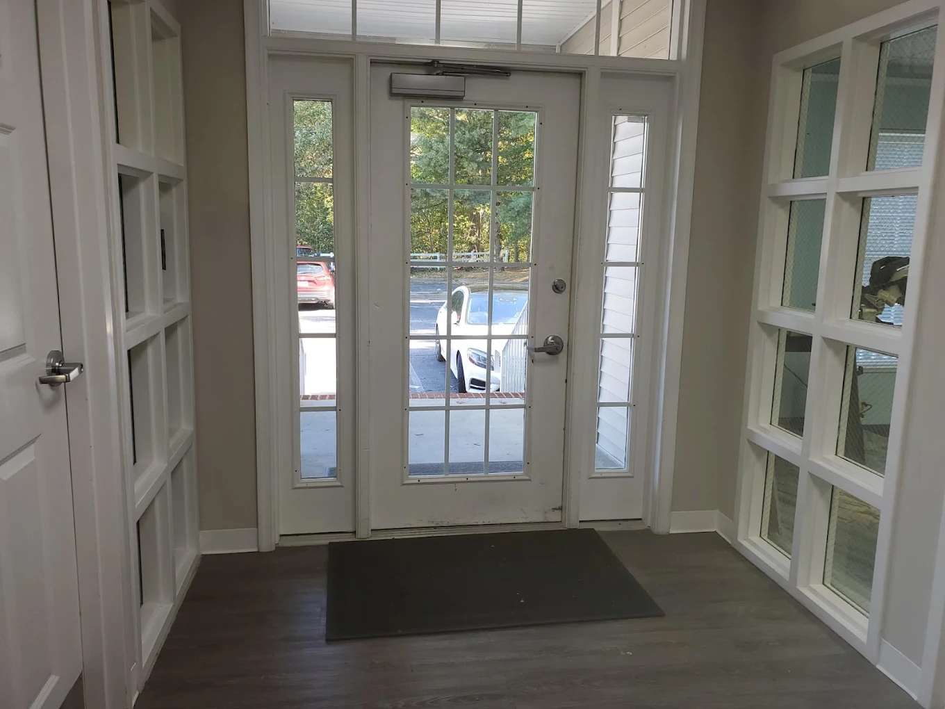 Glass entrance door viewed from inside the facility