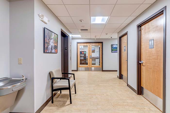 Bright hallway with wood doors