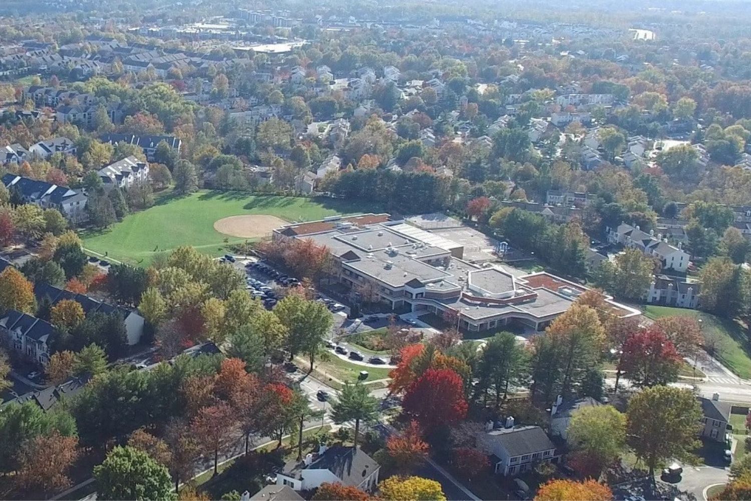 Aerial view of facility in private neighbourhood.