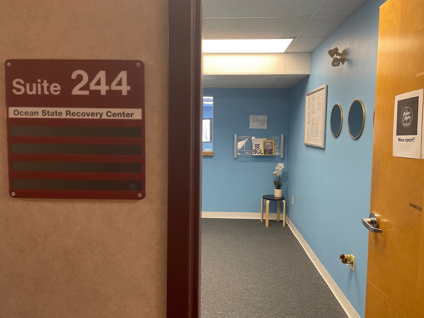 Entrance to with waiting area and reception in view.