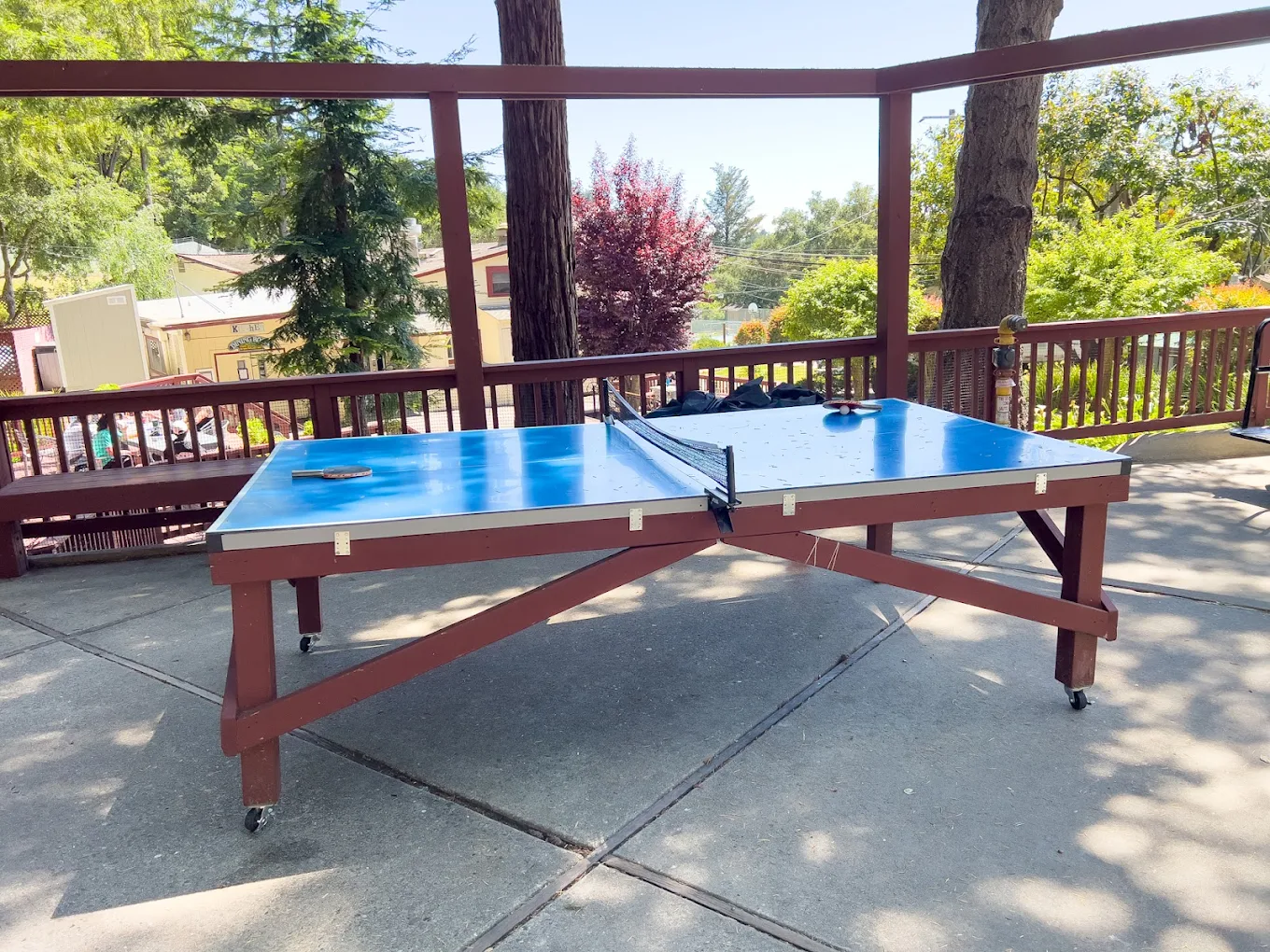 Ping pong table on shaded outdoor recreation deck