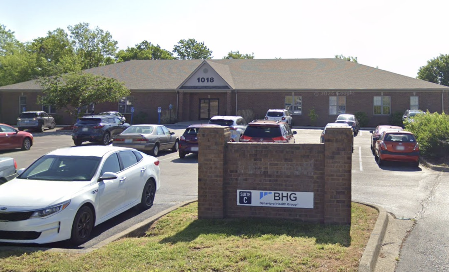 Brick exterior of BHG Richmond Treatment Center with parking lot