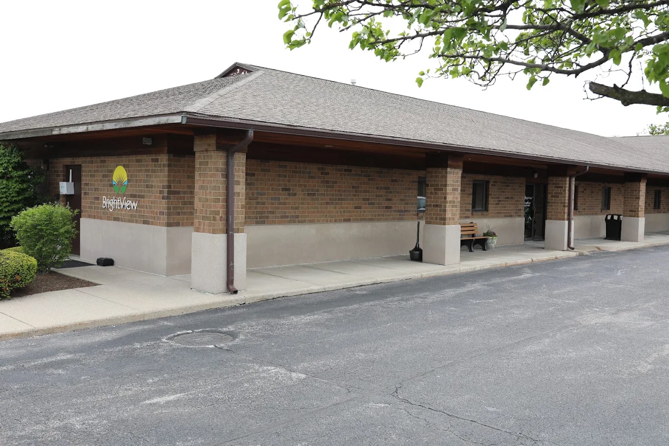 Brick exterior of BrightView Maumee with covered walkway