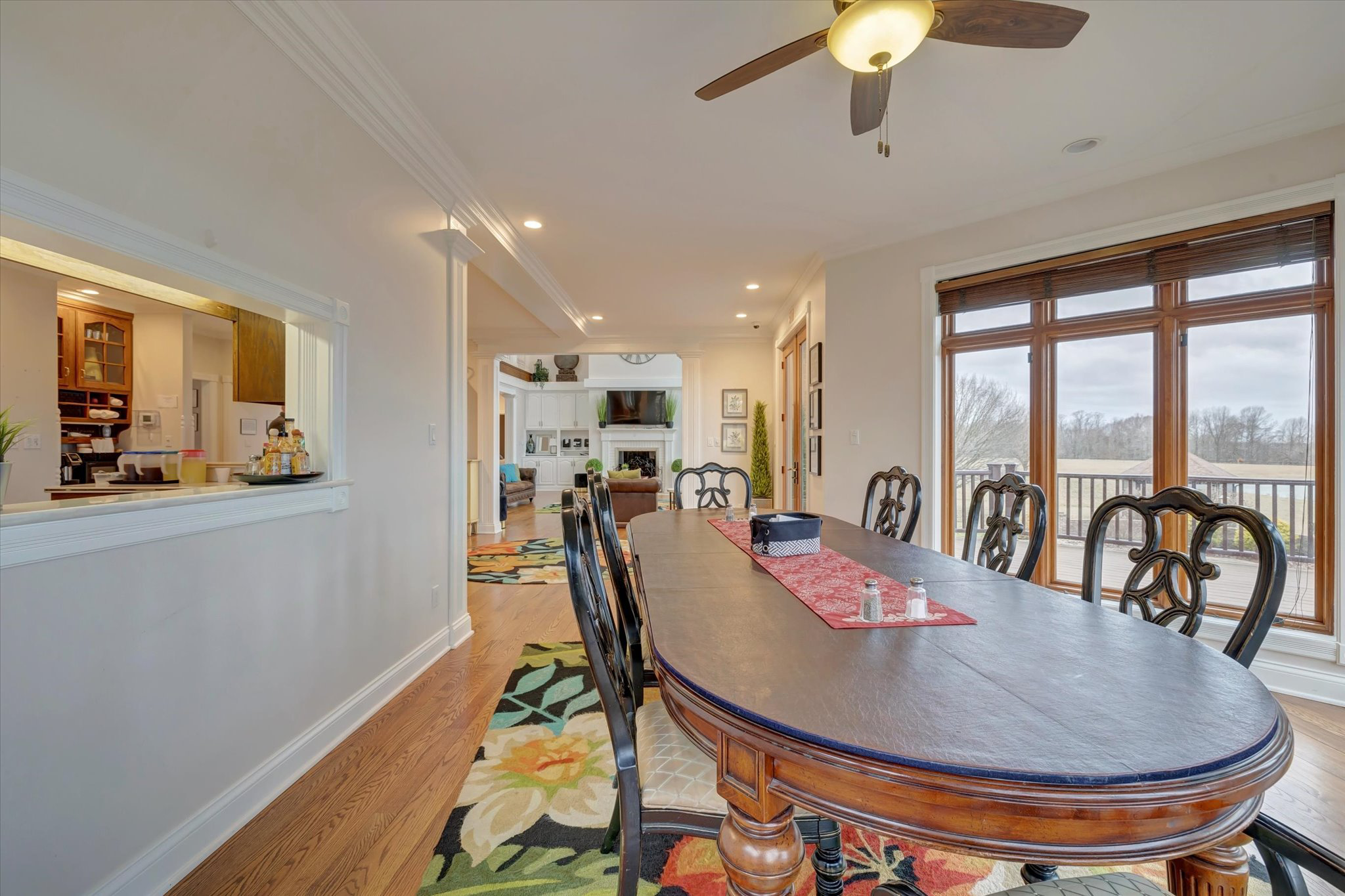 Dining area with large table and scenic outdoor views
