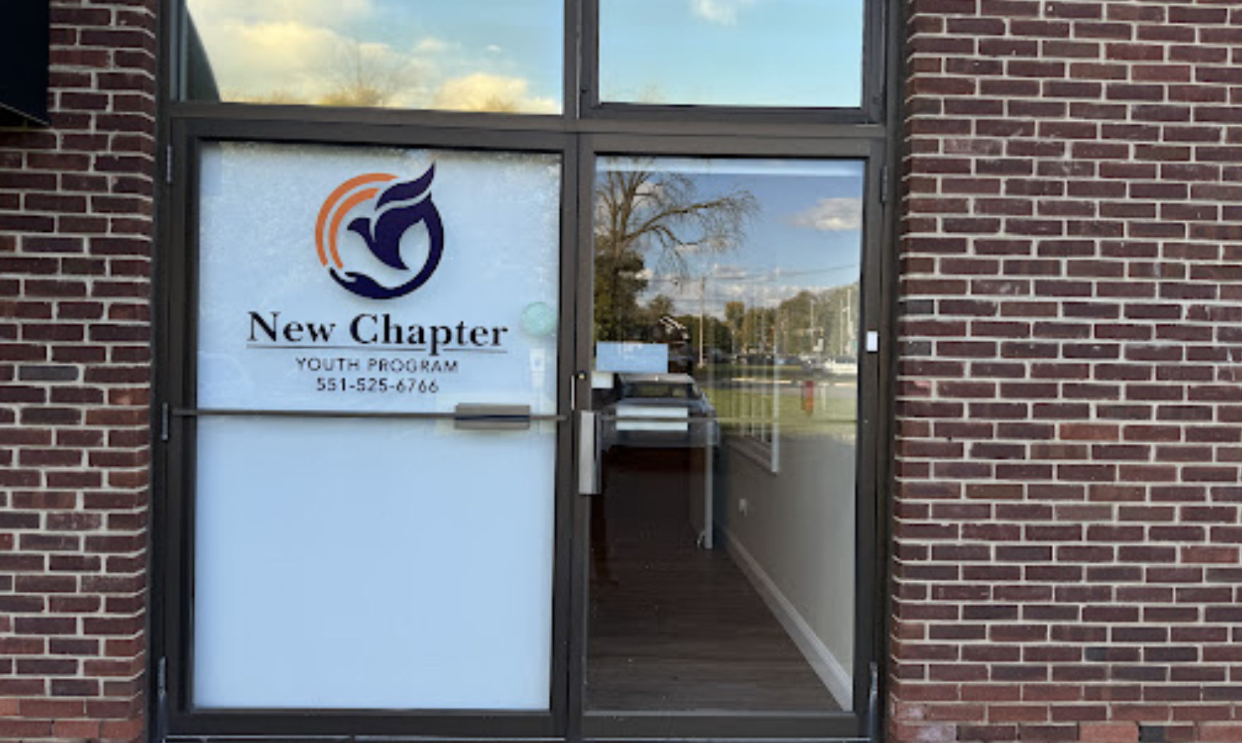 Facility entrance with New Chapter logo on door