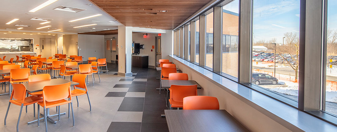 Dining room with tables and seating at Helio Health Elements
