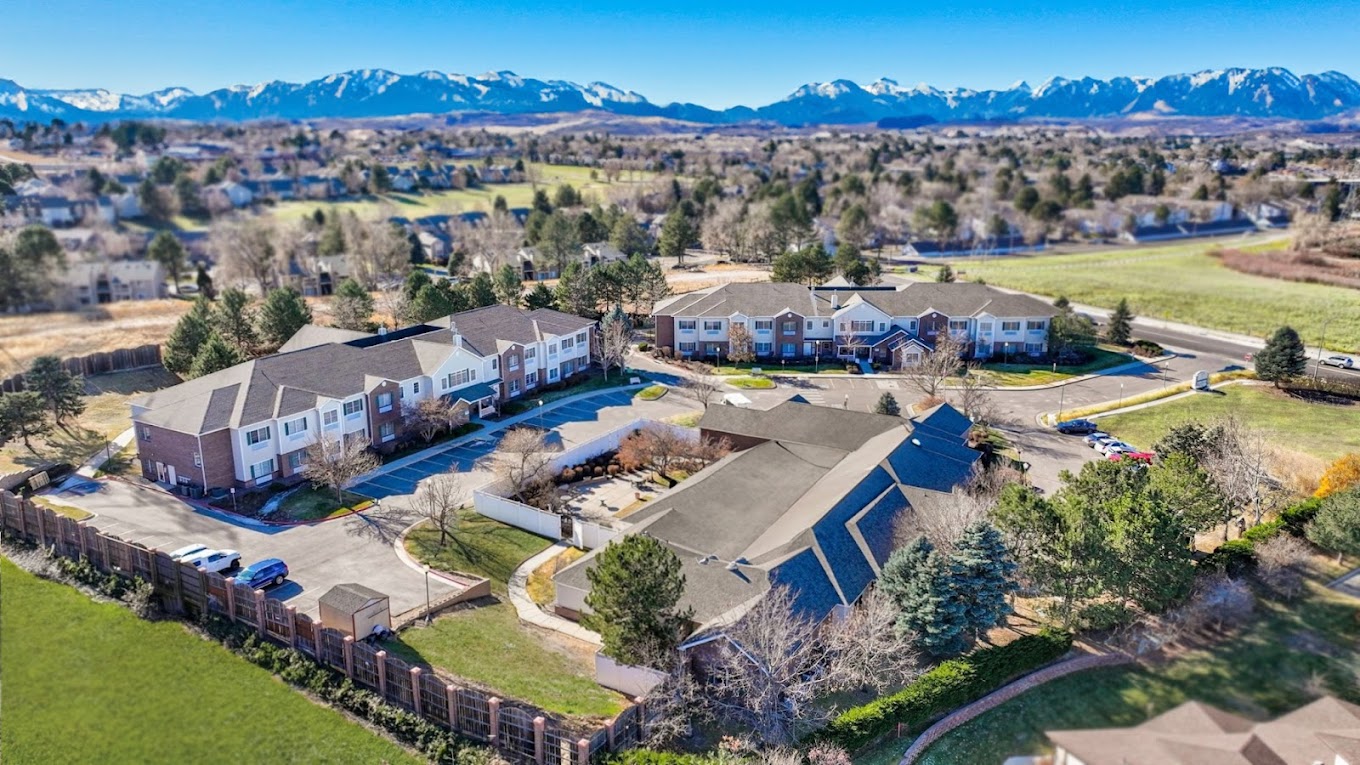 Aerial view of rehab campus with mountain backdrop