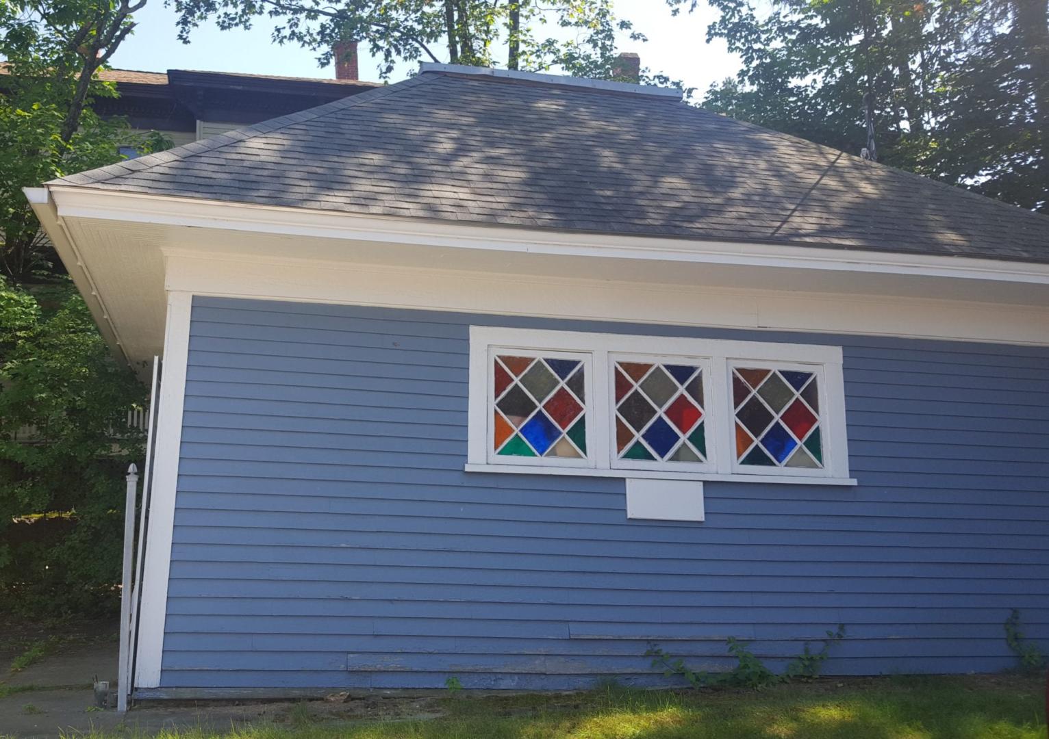 Studio building with diamond stained glass windows