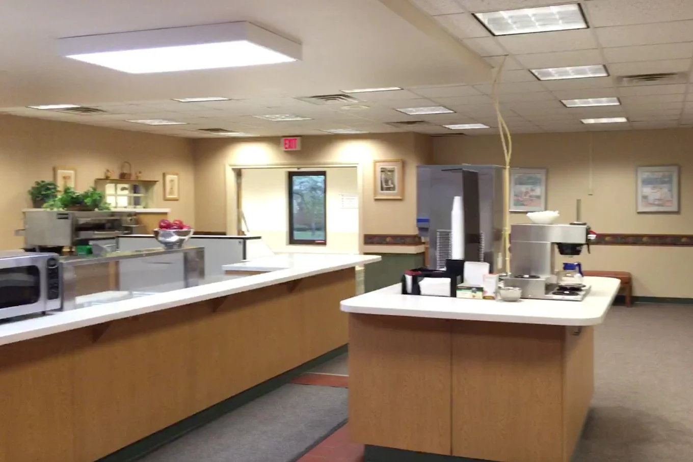 Pantry area with counters, cabinets, and food prep space