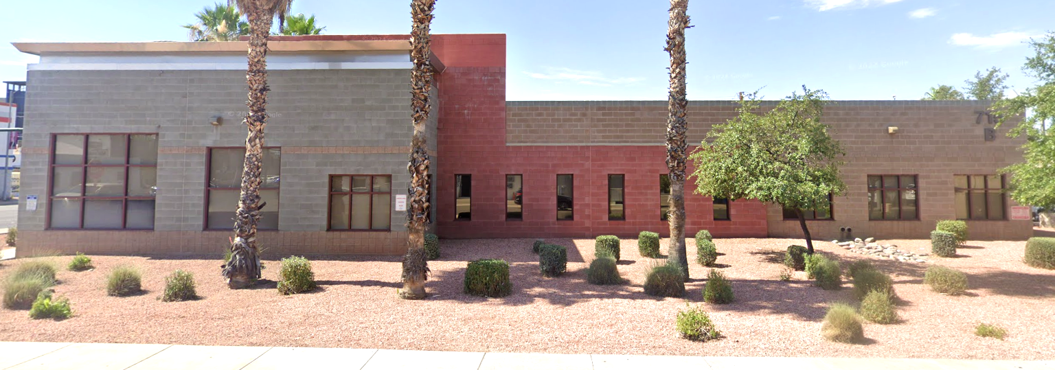 Rear exterior of Florence Crittenton Therapeutic Group Home in Phoenix with desert landscaping.