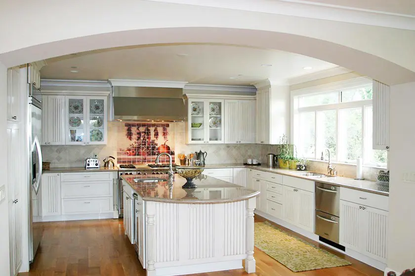 Spacious kitchen with island and large windows