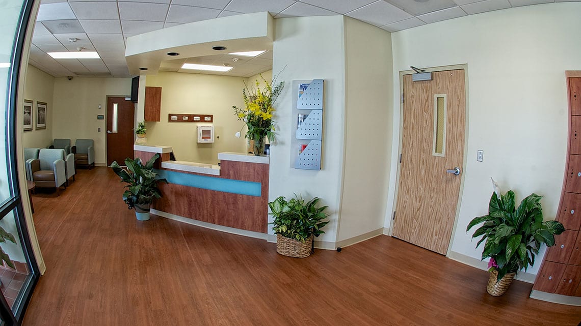 Lobby area with reception desk and seating