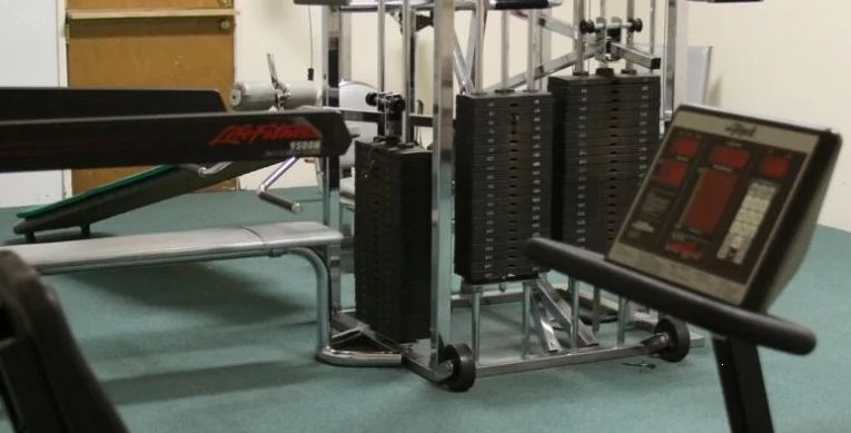 Exercise equipment and machines in small gym room