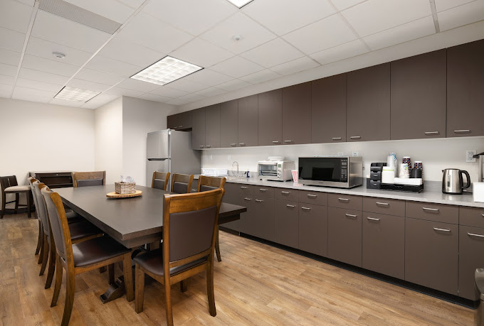 Dining area with table and chairs.