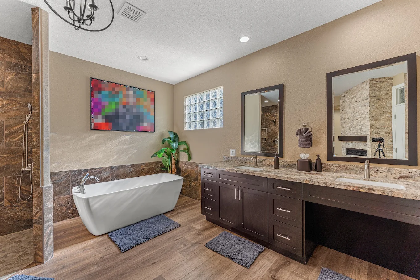 Bathroom with soaking tub, walk-in shower, and double vanity