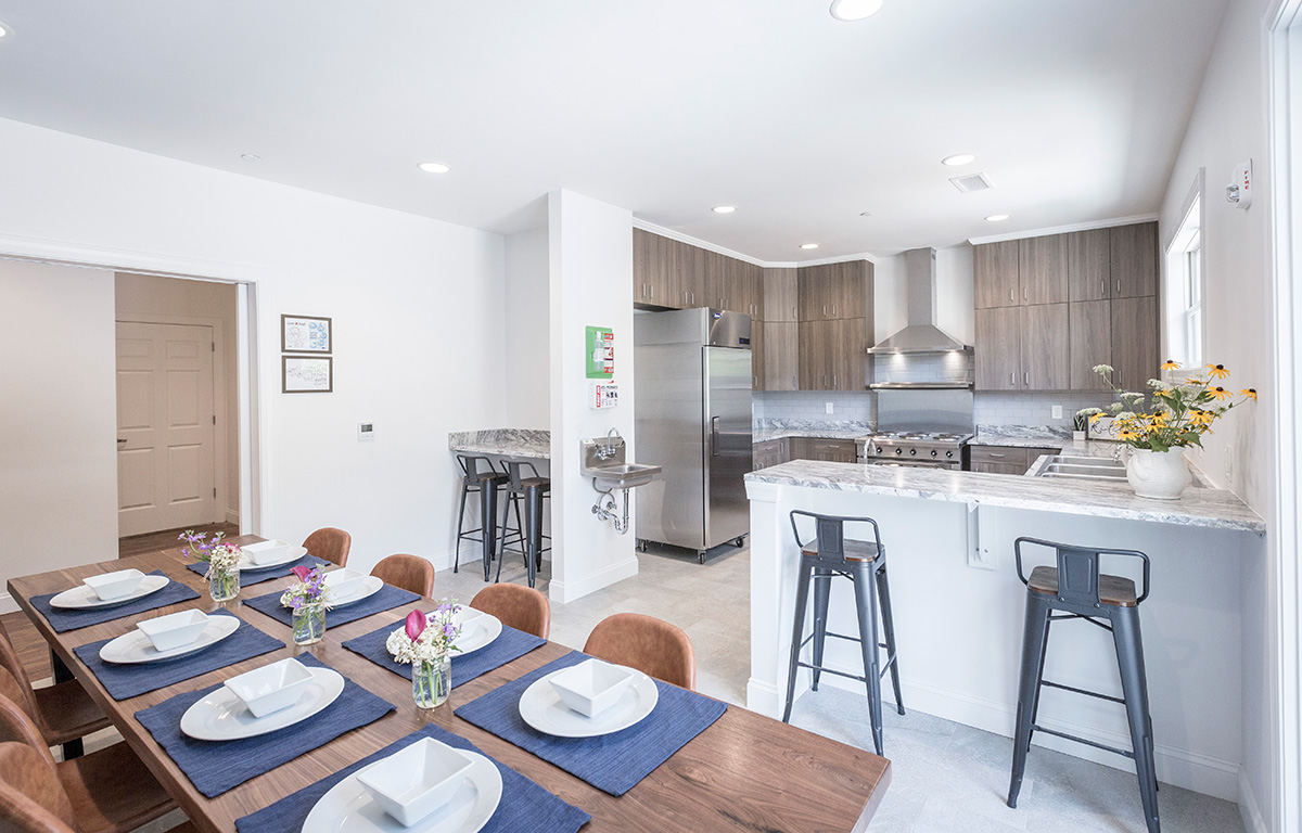  Table set with square plates and flower centerpieces