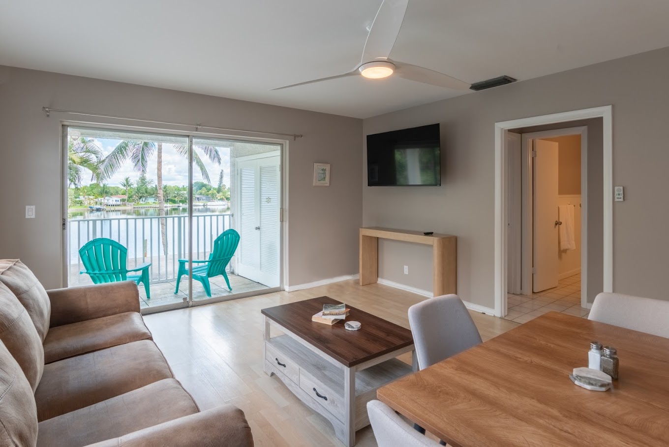 Living space with sliding doors and lake view