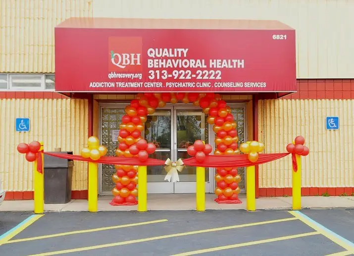 The welcoming entrance of Quality Behavioral Health decorated with red and yellow balloons.