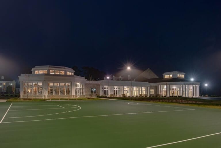 Outdoor sports court and building lit at night