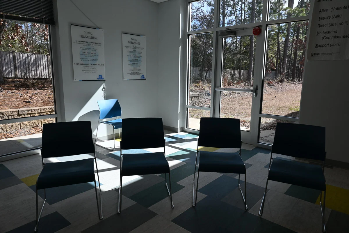 Meeting room with chairs arranged around a table