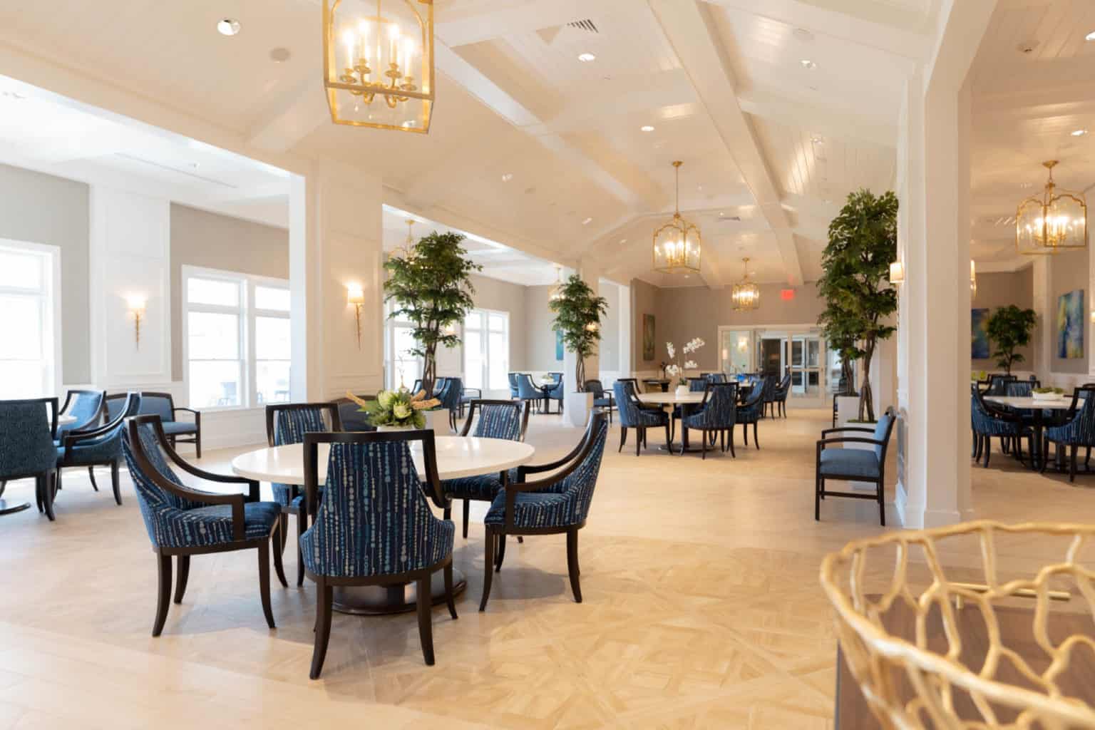 Spacious dining room with communal seating and natural light
