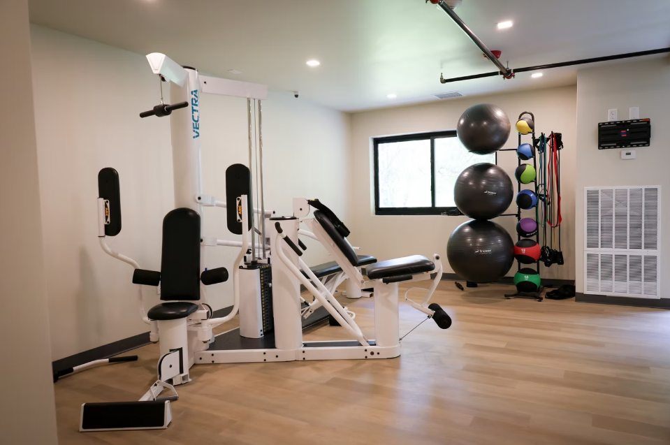 Gym with weight machine and yoga balls