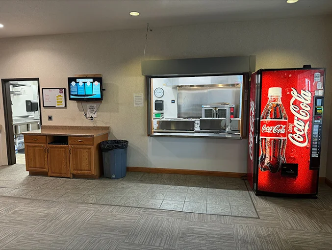 Dining area with service window and beverage machine