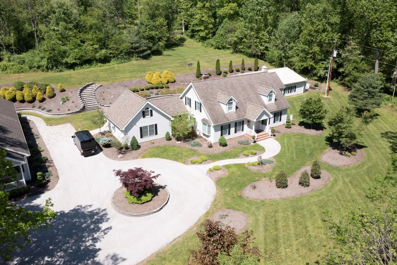 Aerial view of rehab facility with landscaped grounds