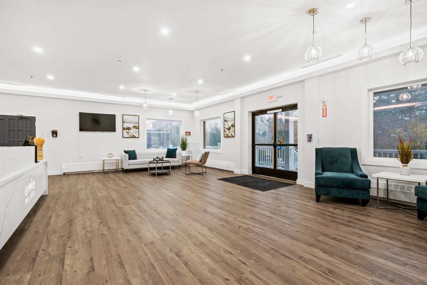 Spacious, bright lobby with modern seating and large windows