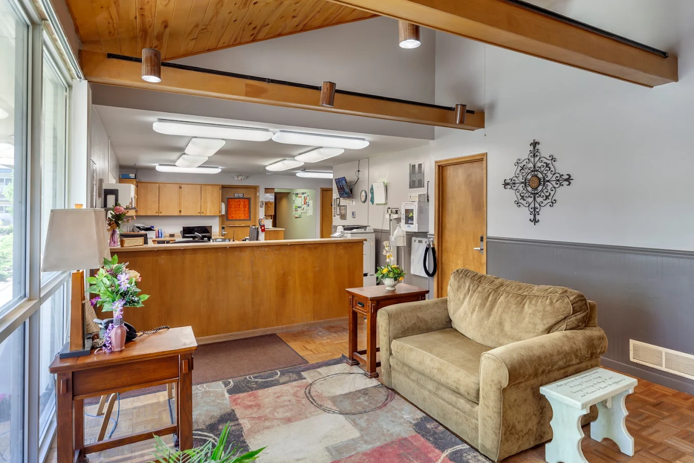 Reception area with seating and front desk check-in