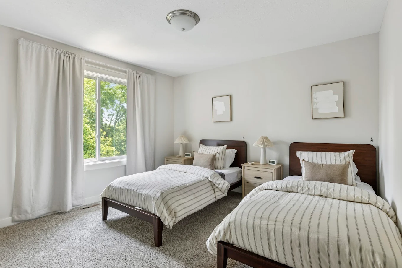 Twin bedroom with striped bedding