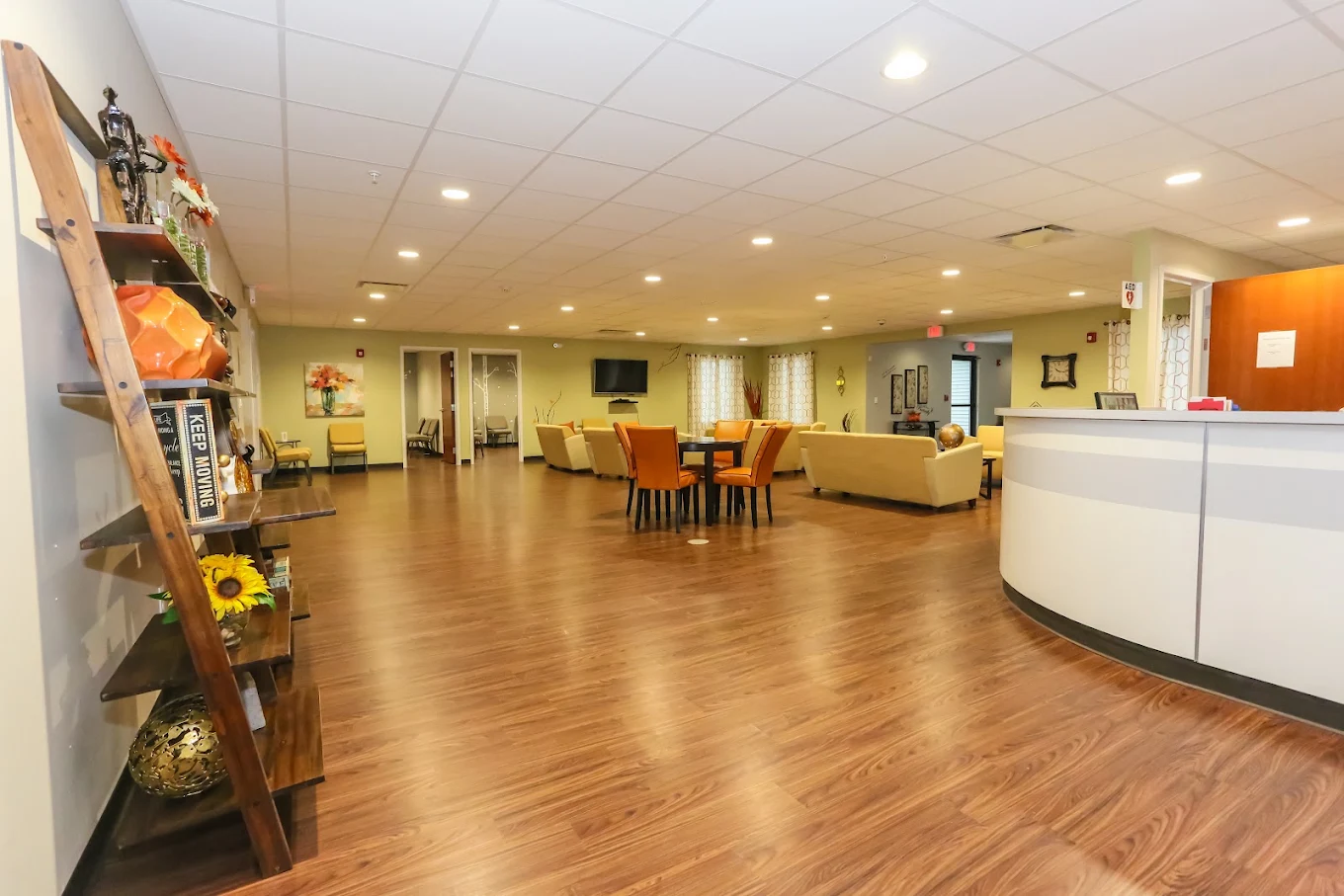 Spacious common area with reception desk and seating