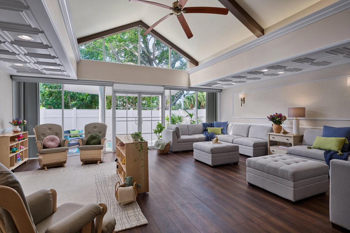 Spacious group room with couches and natural light