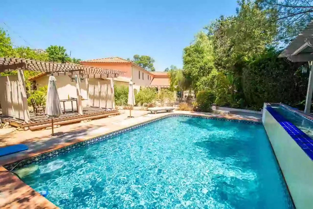 Outdoor swimming pool with lounge seating