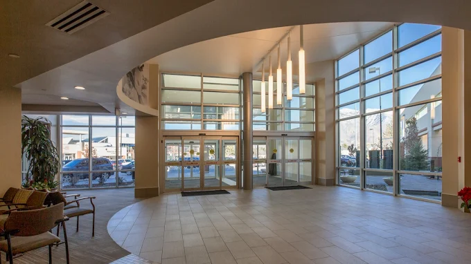 Large entryway with windows and natural light