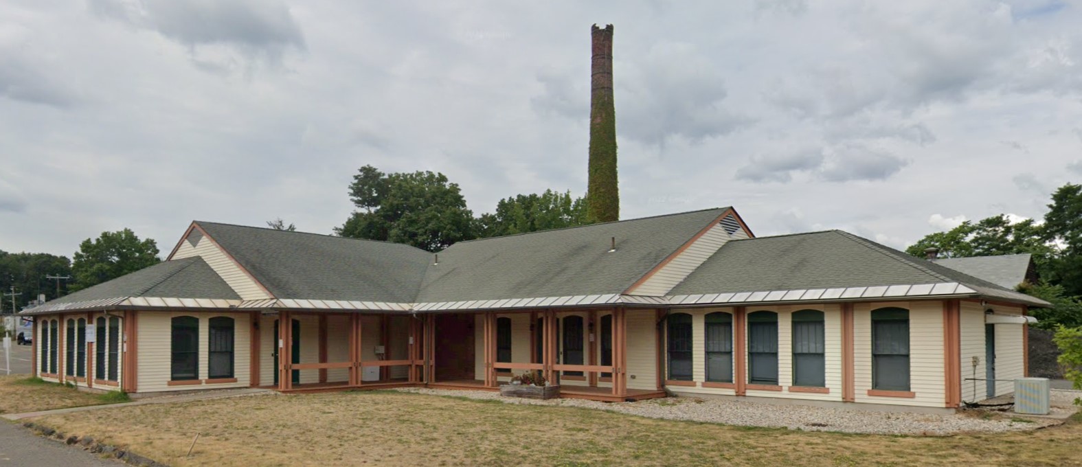 Front view of the rehab facility building with a welcoming entrance.