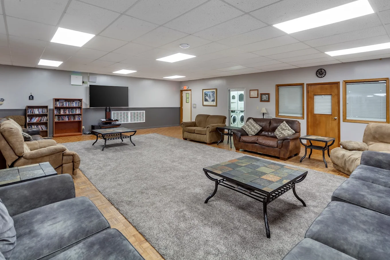 Comfortable lounge with sofas and shared television space