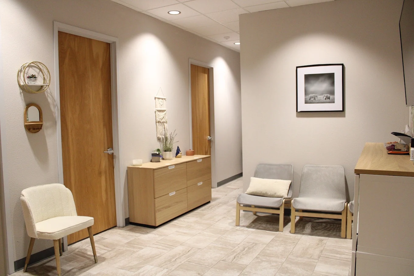 Reception area with seating and private offices