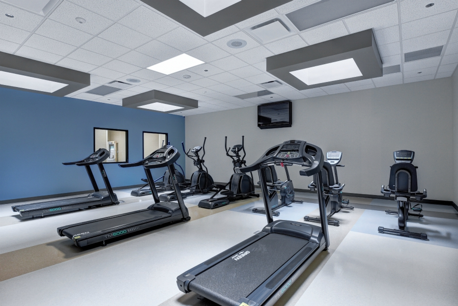 Rehab center gym with treadmills and cardio equipment
