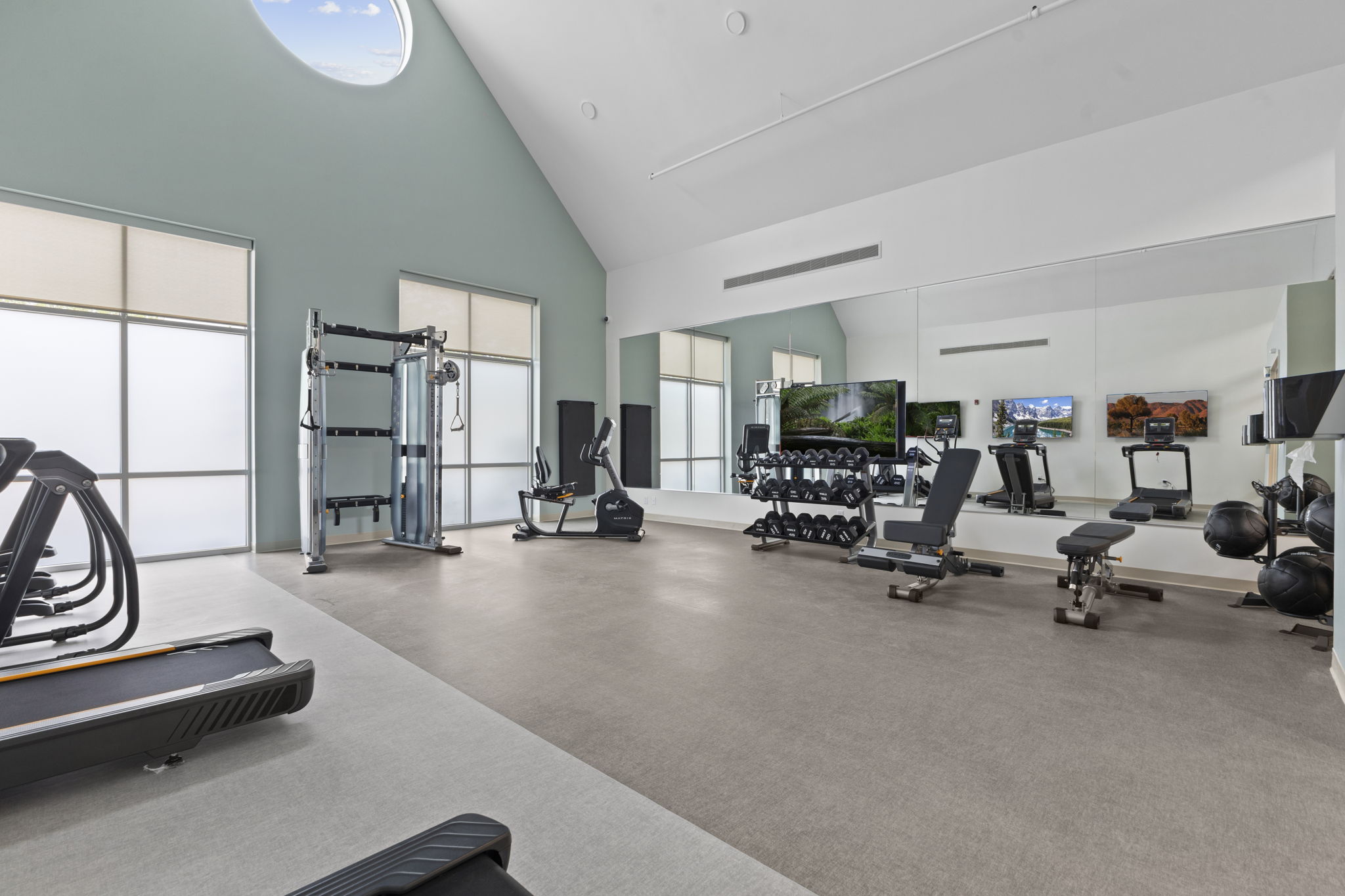 A well-equipped fitness gym with exercise machines.