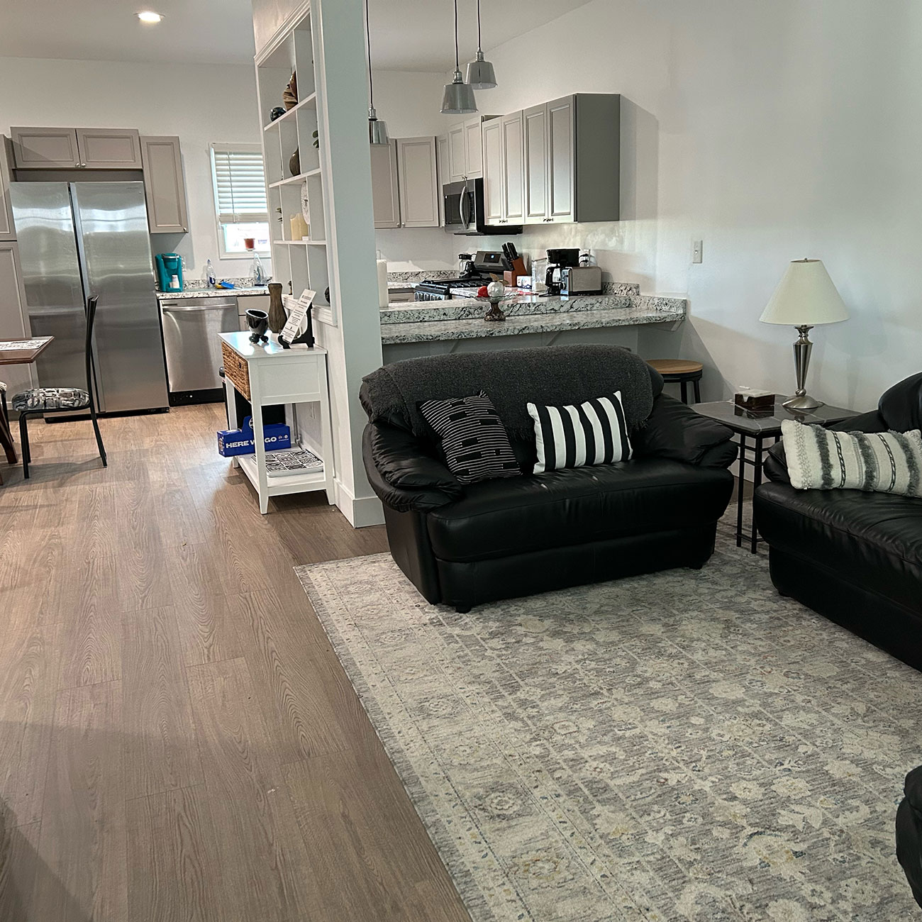 Open living room and kitchen area in women's recovery residence