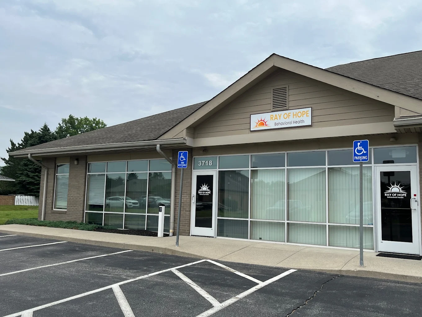 Front entrance with accessible parking spaces