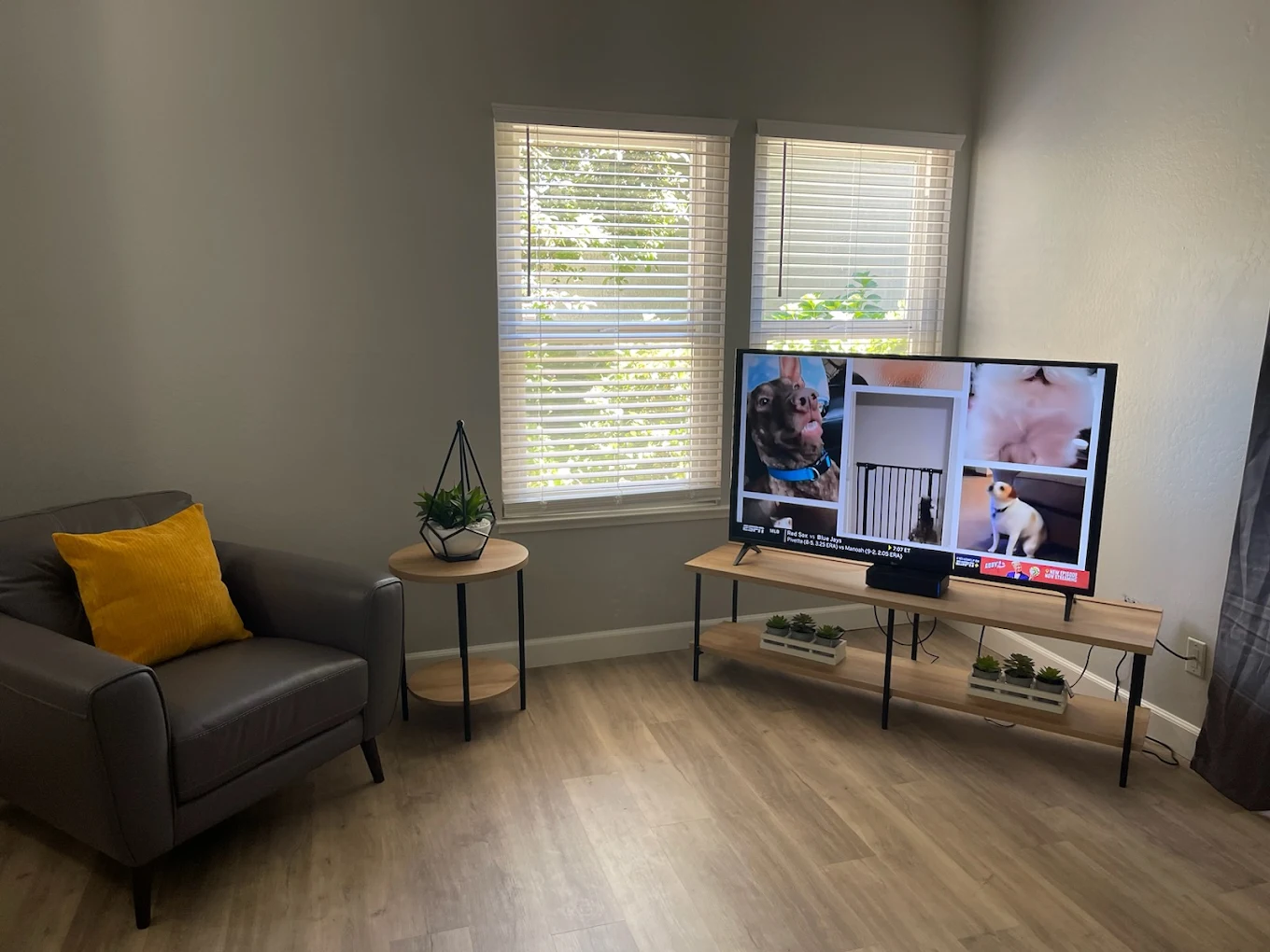 Chair and TV in corner space with natural light