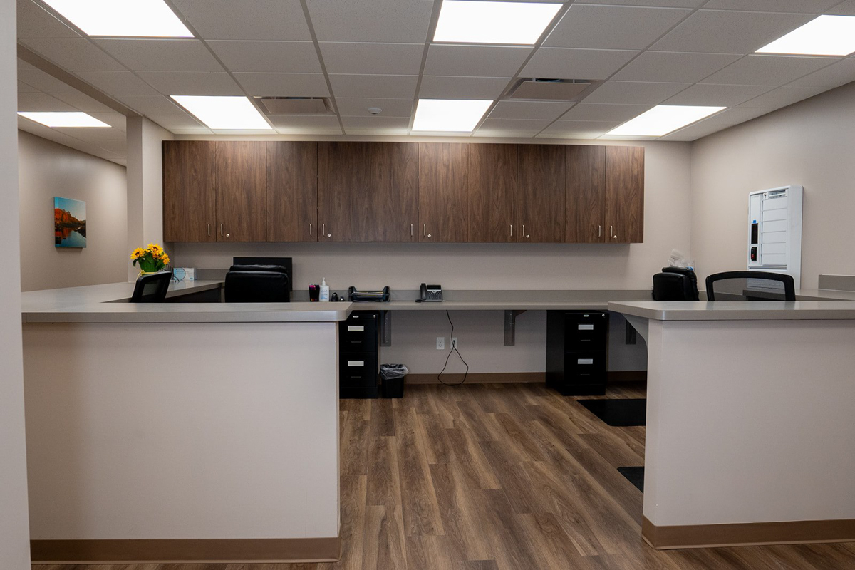 Nurses station with reception counters and storage cabinets