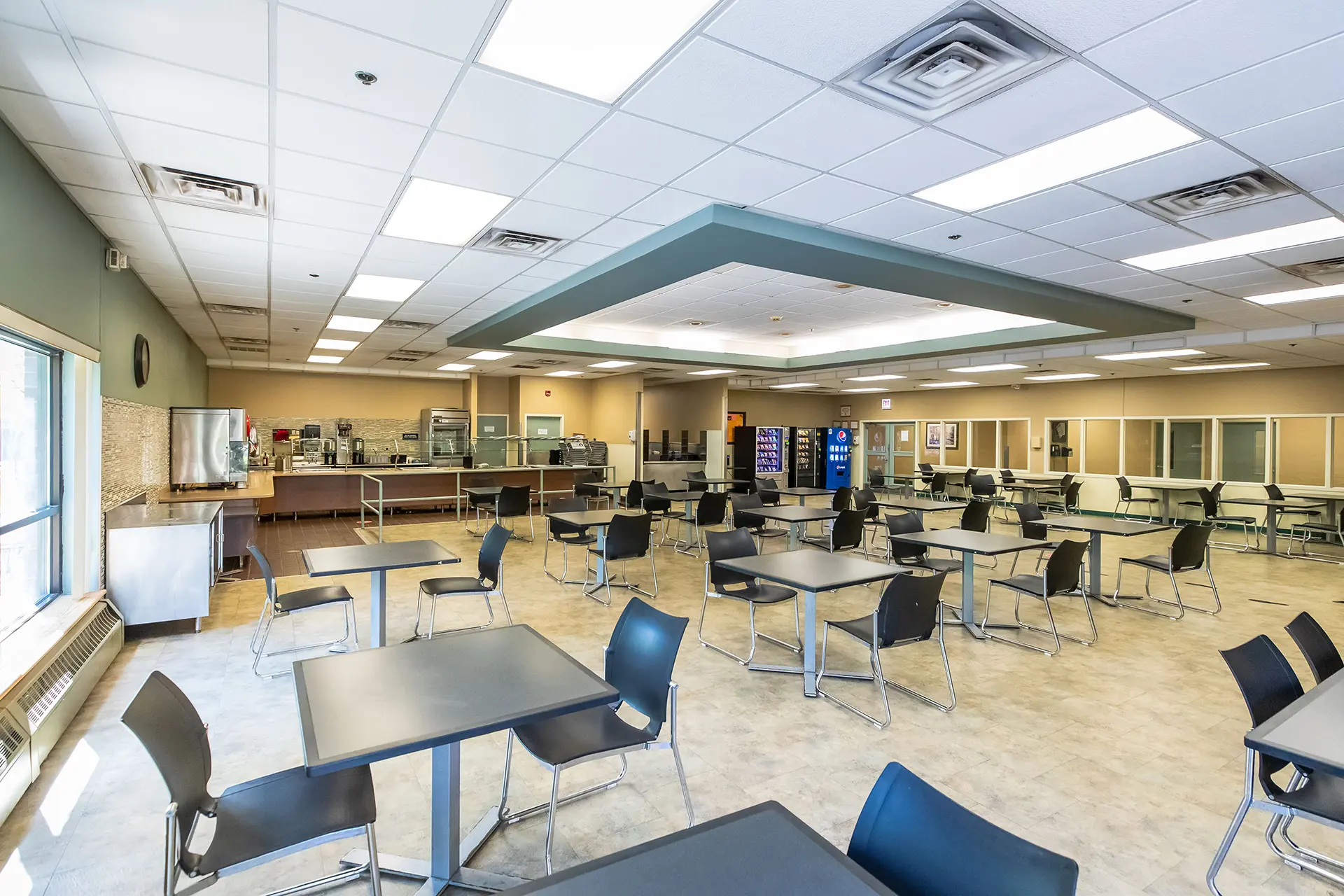 Spacious dining hall with tables and chairs