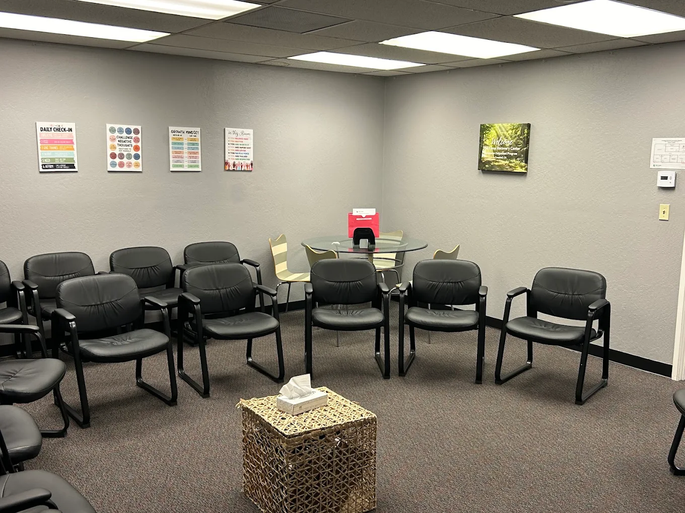 Group therapy room with chairs arranged in a circle