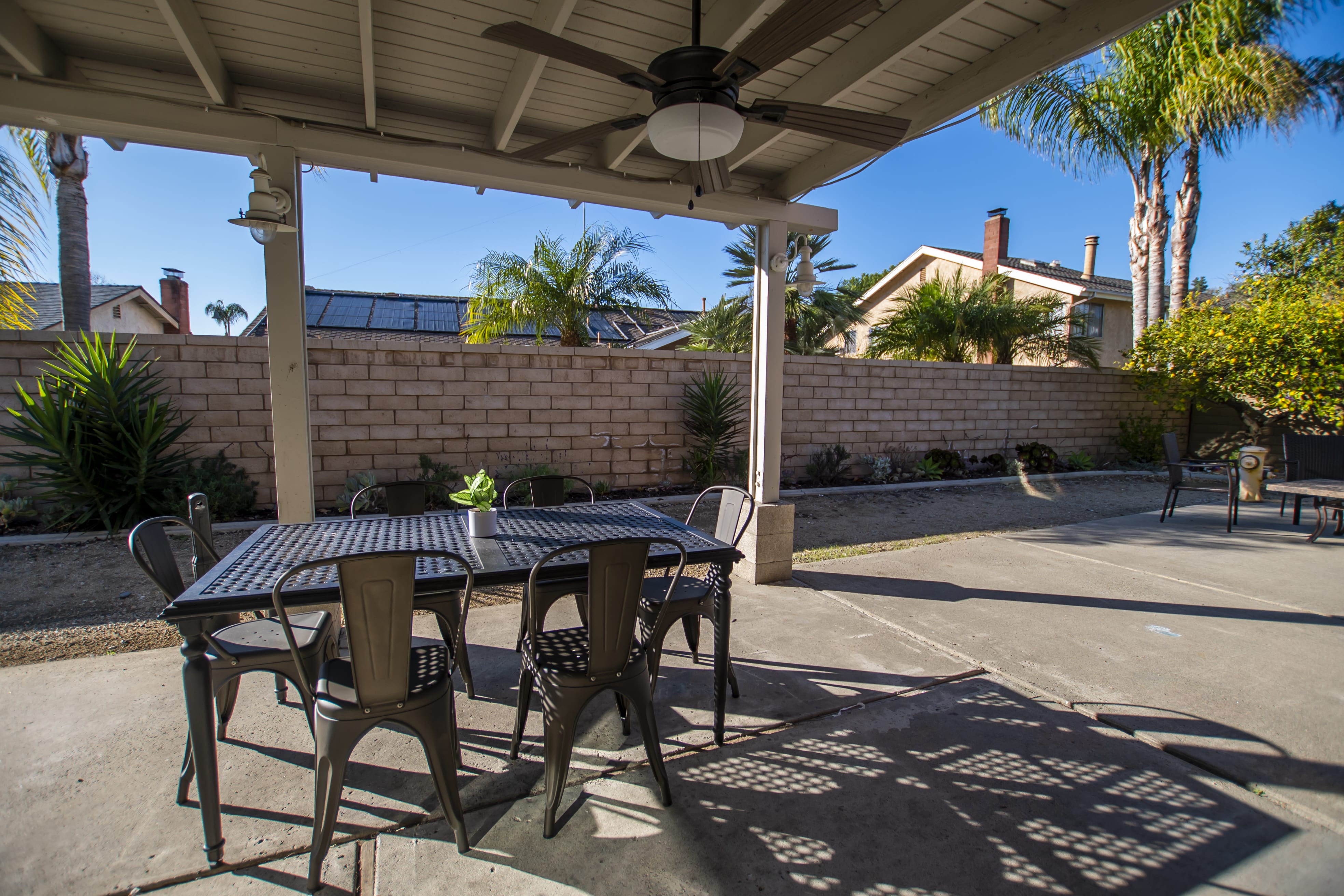 Covered patio with outdoor dining table
