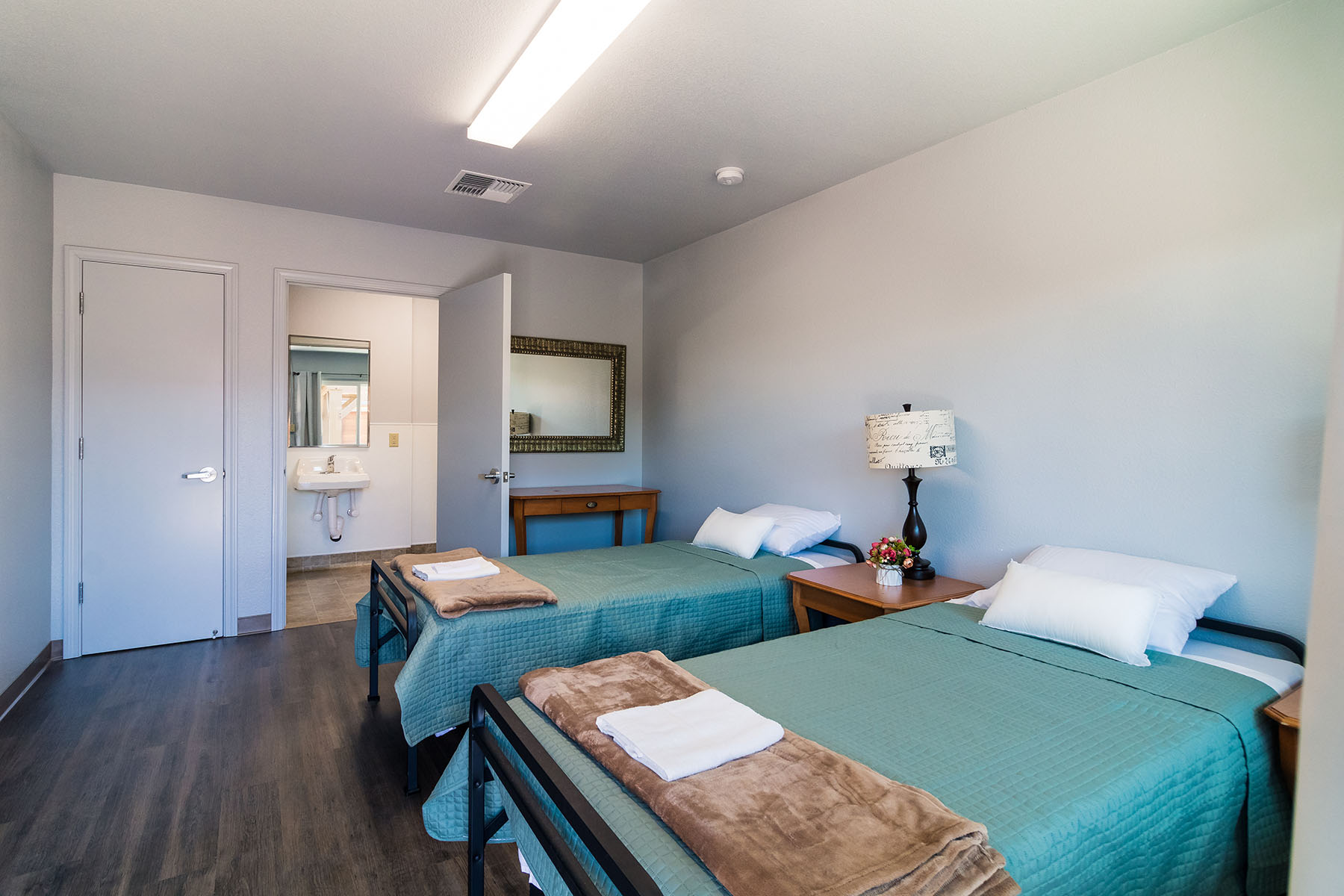 Shared bedroom with attached bathroom